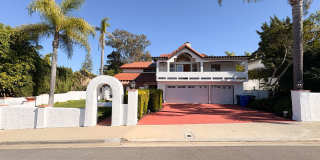 Welcome to this stunning 4-bedroom, 3-bathroom home located in the desirable La Costa neighborhood of Carlsbad! Gallery 1