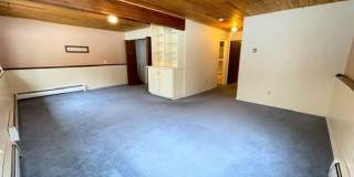 East Anchorage Four Bedroom Home with Bonus/Family Room, Fireplace, and Attached Garage Gallery 1