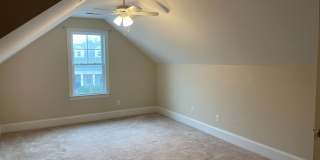 Beautiful 3 bedroom/2 bath home with sunroom and finished room over garage! Gallery 21