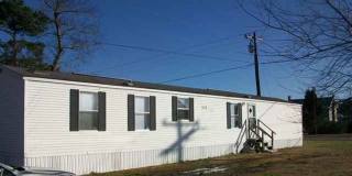 Lovely three bedroom two bath mobile home located minutes from the Camp Lejeune back gate in Hubert. Gallery 1