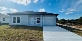 Brand-New Modern 2BR/2BA Home with Garage on Oversized Lot – Prime SW Lehigh Acres Location Brand-New Modern 2BR/2BA Home with Garage on Oversized Lot – Prime SW Lehigh Acres Location Gallery 1