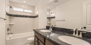 Beautiful two-story home with a walk-out finished basement is for the perfect family home Gallery 26