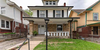 Stunning 4 Bed, 2 Bath Home with Spacious Porch Gallery 1