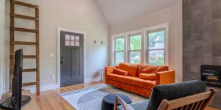 Completely remodeled like new Gingerbread midtown cottage with gleaming hardwoods, converted from a 3/1 to a 3/2. Gallery 7