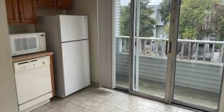 Modern Duplex with Pool, Parking, 2 balconies and 1 deck, Large Bedrooms,1.5 bath Laundry inside Gallery 3