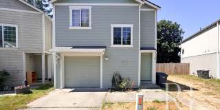 Pet-Friendly 3-Bedroom Home with Fresh LVP, Stylish Updates & Attached Garage Gallery 1