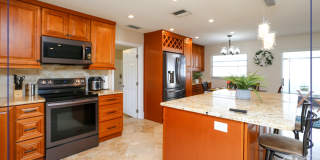 *** LOCATION LOCATION LOCATION ** THIS NICELY DECORATED 4/3 HOME CLOSE TO MERCATO *** PERFECT FOR THE SEASONAL VISITOR** Gallery 1