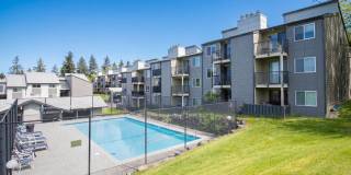 Renton Condo with Private Patio, Pool & Covered Parking! Gallery 1