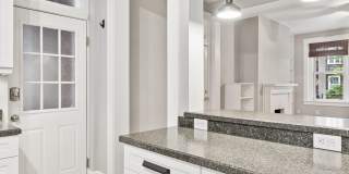 Stunning 1st floor condo located in the heart of highly sought after West Ghent featuring 3 bedrooms and 2 full bathrooms! Gallery 14
