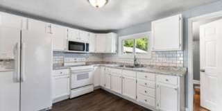 Beautifully updated with modern upgrades and cozy charm. PETS WELCOME Gallery 5