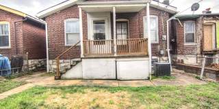 This 2 bedroom 1 bath home has been completely refinished with brilliant hardwood floors throughout! Gallery 9