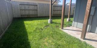 2 Bedroom 1 bath house with extra large double car garage and extra storage space! Gallery 23