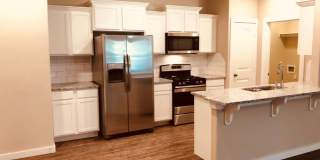 Beautiful 3 bedroom duplex is located between Rockwell and MacArthur off NW 50th Street. Take Mueller Ave. north and Oakwood is the 1st right. Gallery 1