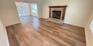 Beautiful 4BR Home with New LVP Flooring & Lawn Care Included Near The U of A! Gallery 6