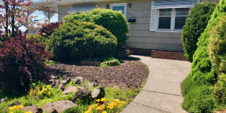 Charming North Hill Home with Beautiful Landscaping and Water Included! Gallery 1