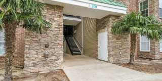 Don't miss this 4-bed, 3-bath condo TWO miles from the ocean! Gallery 2
