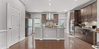 Welcome to 9618 Stockwell Lane—an exceptional 3-level, 4-bedroom, 3.5-bath townhome in the heart of Fairfax that has been thoughtfully updated to offer both style and functionality. Gallery 15