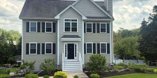 Beautiful 4 Bedroom Colonial Home with Finished Basement, 2-Car Garage & Private Backyard | Tewksbury Gallery 1