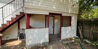 1 bed downstairs unit with courtyard, laundry access,brand new appliances, paint and flooring, includes all utilities up to 200 monthly Gallery 1