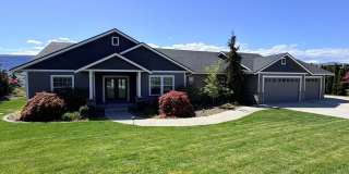 Luxury, golf course living with VIEWS! 3+ bed, 3 bath, three car garage and so much more! Gallery 1