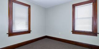 Charming 3BR Home with Classic Woodwork, Porch & Bonus Attic Space Gallery 12