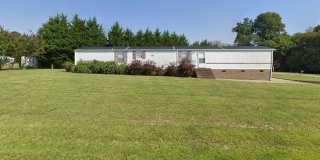 Charming Rural Home with Large Yard & Storage Gallery 1