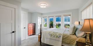 Impeccable Low Bank Bainbridge Waterfront Home with Private Dock Gallery 33