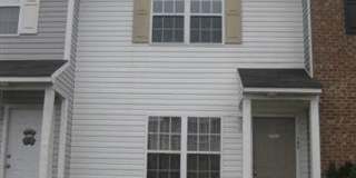 Charming two bedroom two and a half bath townhouse that is centrally located! Gallery 1