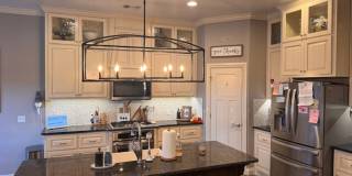 WOW! This home has it all, 3 full bathrooms, 5 true bedrooms AND a bonus room. great outdoor space, wood and ceramic tile flooring in the main living space, Open kitchen, all in a gated community! Availability is flexible on or before July 1 Gallery 7