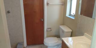 2 Bed/2 Bath 1200 Sq. Ft. home with BONUS ROOM, indoor laundry & a fenced yard!! Gallery 8