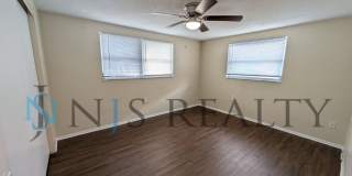 True 3 Bed~2 Bath~with garage. Over 1,000 sq ft, with updated kitchen & bathrooms, large open living space & a fenced in yard!! Gallery 9