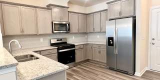 Like-New Townhome Walk to Downtown | Garage + Internet Included Gallery 6