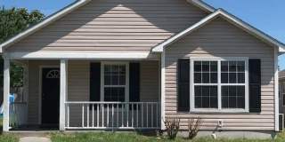 Cozy 3 Bedroom Home with Spacious Kitchen and Private Backyard Gallery 1