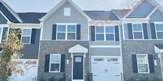Beautiful 3 Bedroom, 2.5 Bath Townhome with First-Floor Primary Suite and 2 Parking Space in Rollman Farms, Raleigh, Available Now! Gallery 1