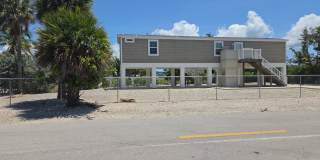 Centrally-Located 2-Bed/2-Bath Home, full perimeter fence with Canal Access Gallery 1