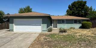 Spacious 3-Bedroom Home with Huge Fenced Yard & RV/Boat Parking Gallery 1