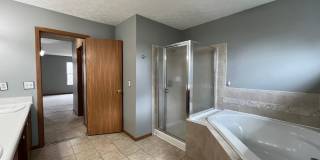 Spacious 4-Bedroom Home with Fenced Backyard, Deck, and 2-Car Garage Gallery 9