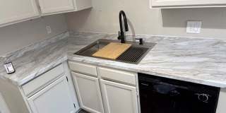 New remodeled 2 bedroom 1 bath unit with private patio and full size washer and dryer hookups!! Gallery 1