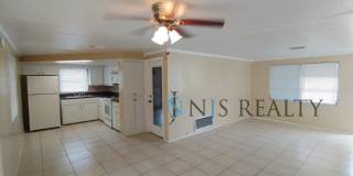 Beautiful 2/2/1 1150 Sq. Ft. with BONUS ROOM!!... tile & luxury plank flooring, Frest paint and a large fenced in yard! Gallery 4