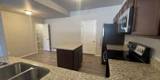 Townhome w/ 2 car garage, A/C-Newer, Low Maintance, & Conviniently Located Gallery 5