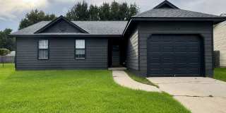 Stylish Home with Open Floorplan & Fenced Backyard Gallery 1
