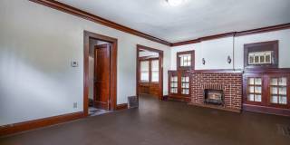 Charming 3BR Home with Classic Woodwork, Porch & Bonus Attic Space Gallery 5
