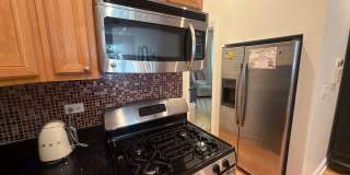 Beautifully updated & maintained 2 bed/2 bath Noble Square condo in an intimate 3 unit building. Gallery 9