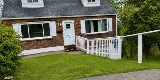 Charming 3-Bedroom Home with Hardwood Floors, Garage & Private Patio Gallery 1