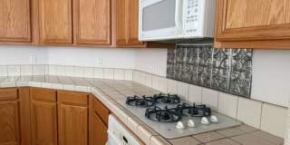 Beautiful 3 bed home with 3 car garage in Indian Hills behind Target Gallery 17