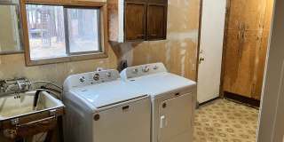 Furnished rental with large fenced back yard. Gallery 21