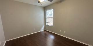 Single-level 3-bedroom home in a desirable Chandler location featuring a 2-car garage and tile roof and wood plank flooring throughout Gallery 28