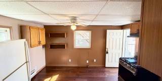 Cozy and conveniently located 1 bedroom, 1 bathroom first-floor apartment with a private entrance! Gallery 6