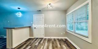 Lovely Three Bedroom Home in KCMO and an Updated Kitchen  w/ Granite and SS Appliances, including a Fenced Yard! Gallery 14