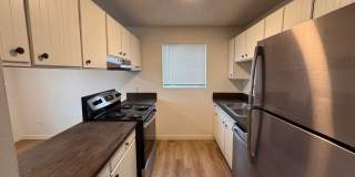 Spacious 1-Bedroom Apartment for Rent in Millwood Spokane Valley - Updated Unit with A/C, Stainless Appliances, and Covered Parking at 9021 E Liberty Ave Gallery 1